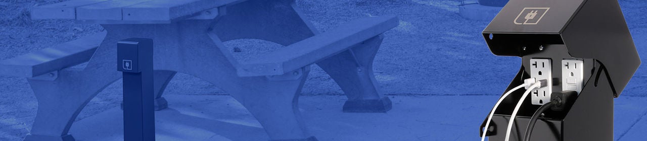 Pedestal de alimentación estándar frente a la mesa de pícnic