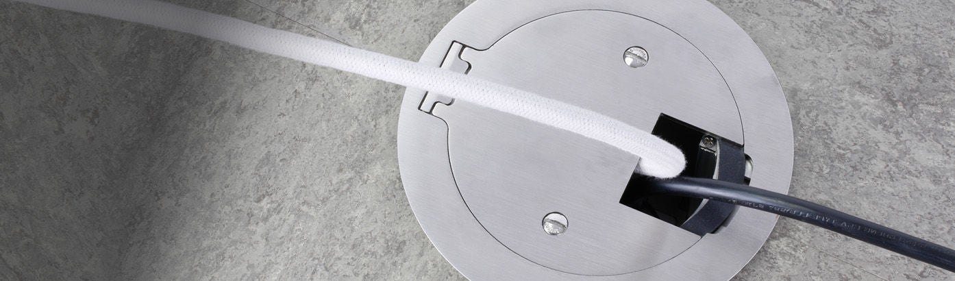 Caja para piso de concreto - Placa empotrada de acero